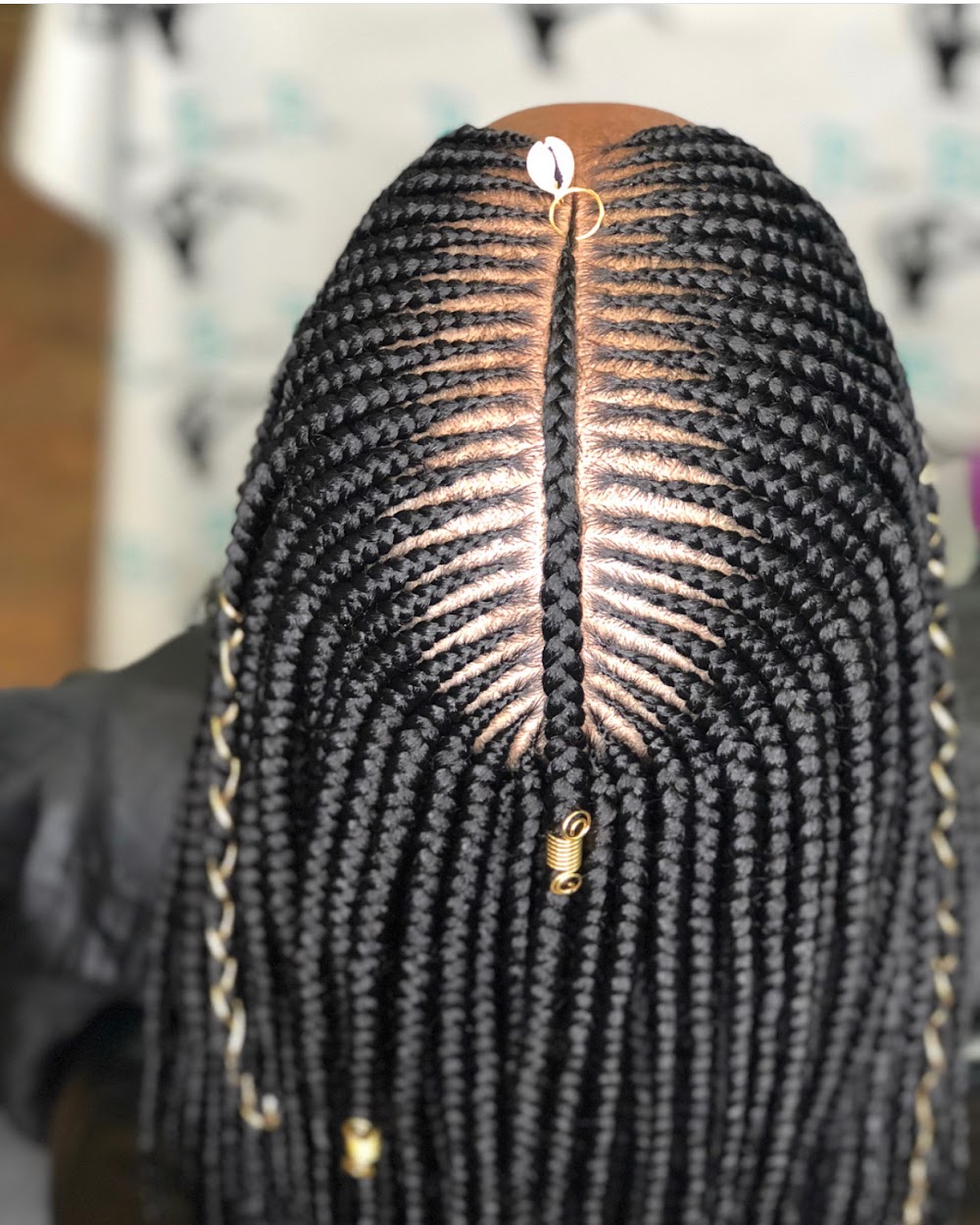 Fishbone feed-in cornrows with gold cuffs, posted by VIP Braids